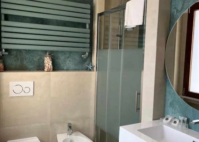 Leda タオルミーナ